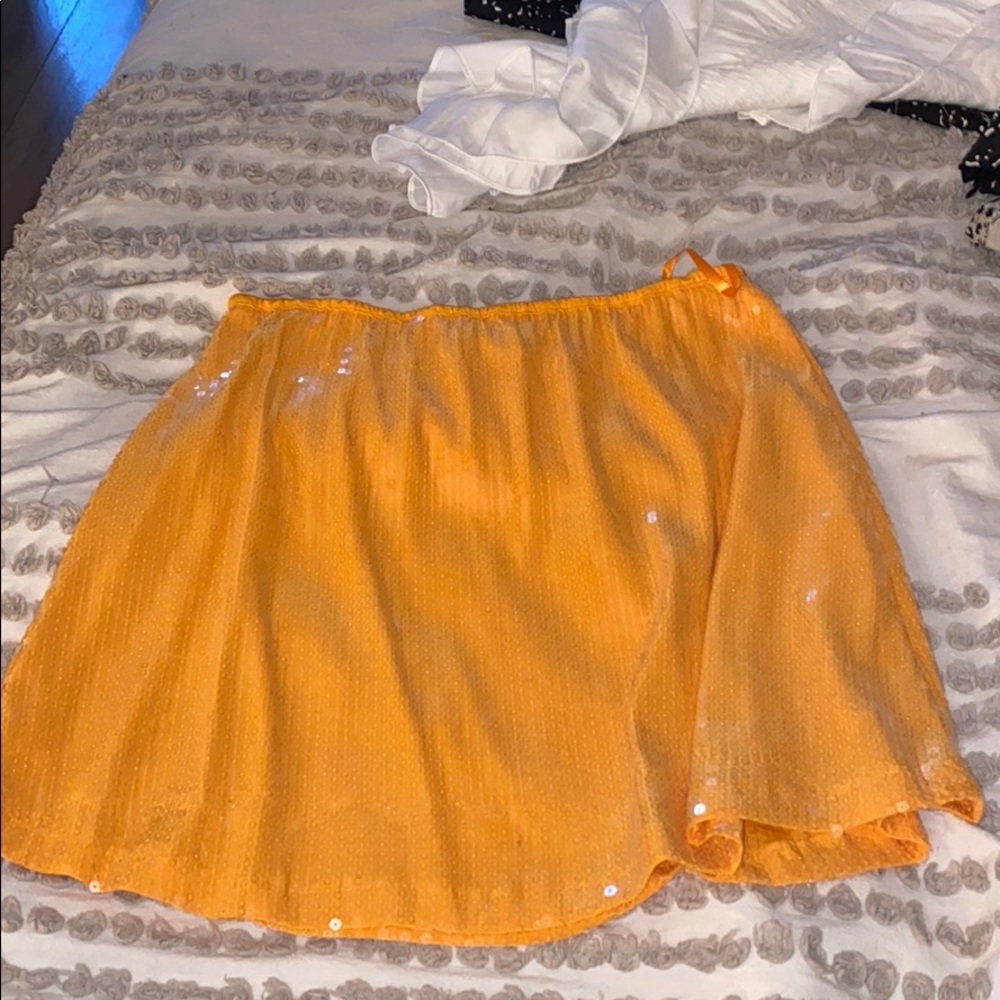 Orange sparkle skirt or can be worn as shirt
